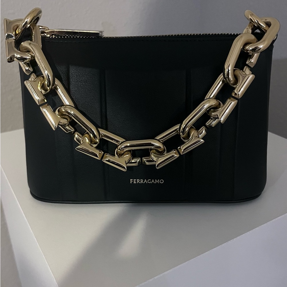 Ferragamo Gancini Chain mini bag in black leather with gold-tone hardware